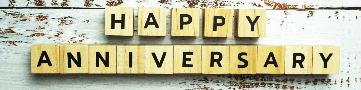 Romantic anniversary gift box with flowers and keepsakes"